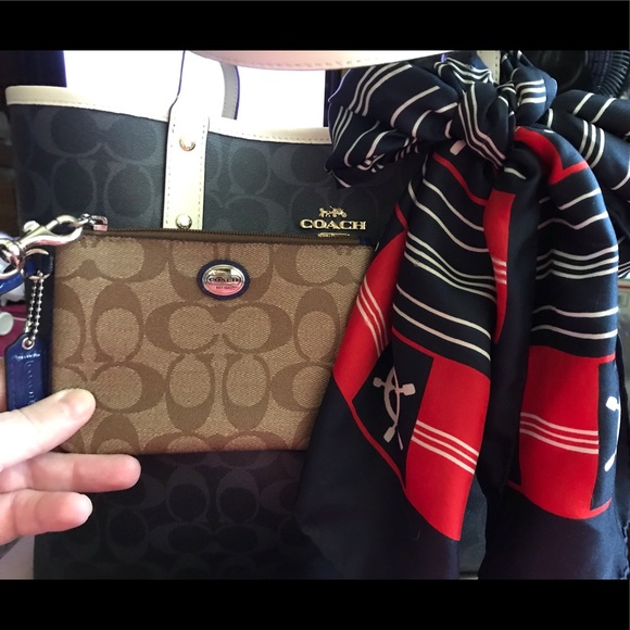 Handbags - Coach wristlet from Spirit of love.